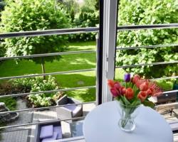 2 rooms with sauna, fitness and beautiful garden