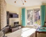 Apartament w Centrum z Ogrodem